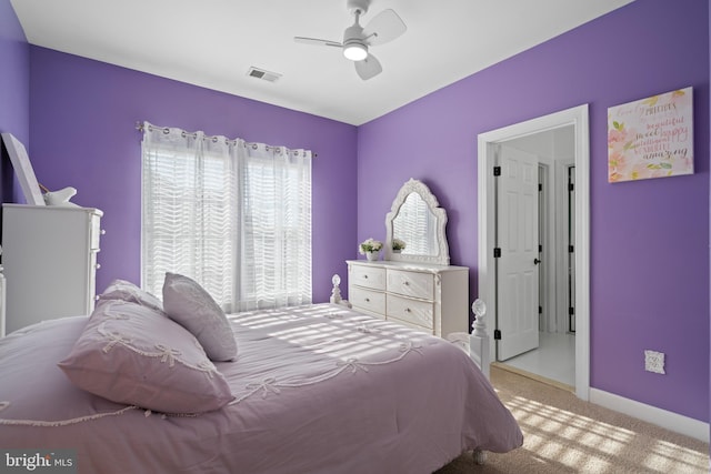 bedroom featuring visible vents, carpet flooring, a ceiling fan, and baseboards