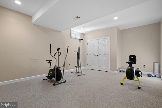 workout area featuring recessed lighting, baseboards, and visible vents