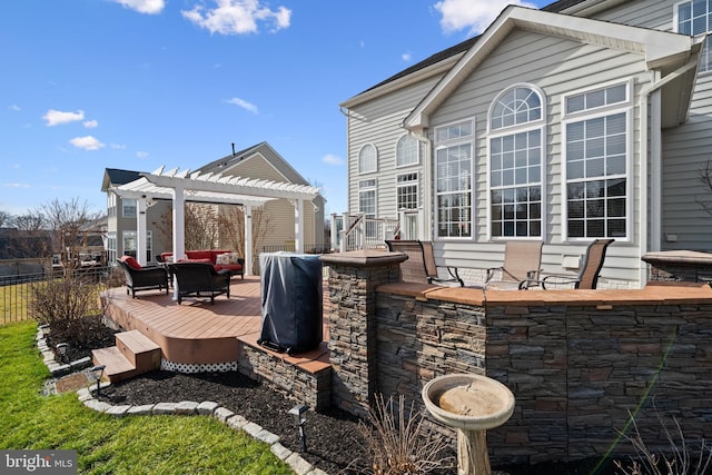 exterior space featuring a pergola and fence