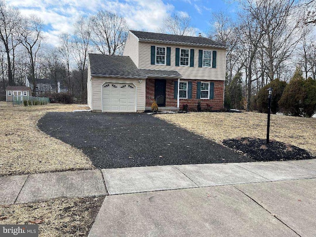 view of front property with a garage