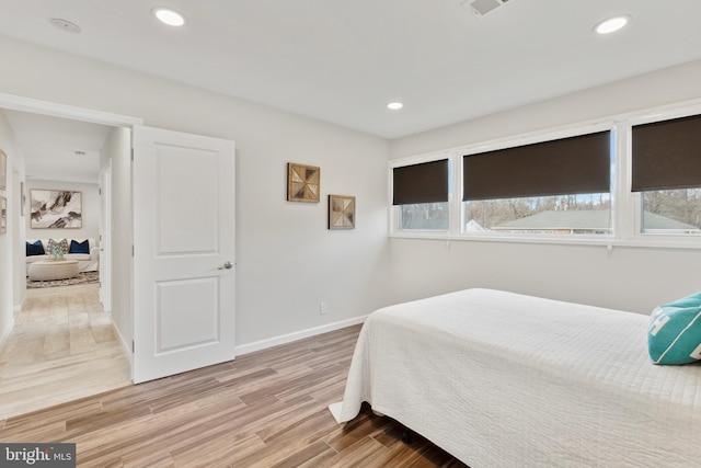 bedroom featuring hardwood / wood-style floors