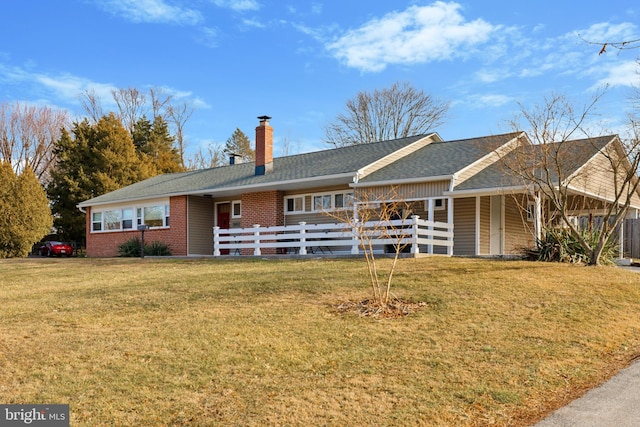 ranch-style home with a front yard