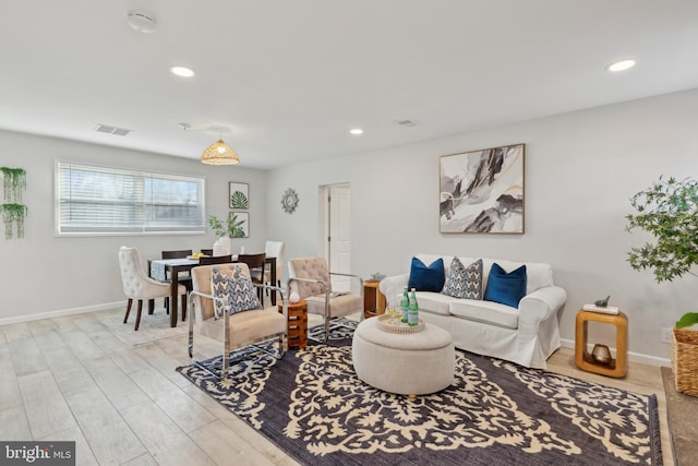 living room featuring light wood-type flooring