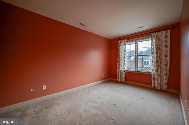 view of carpeted spare room