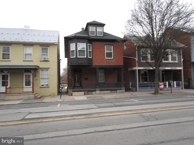 view of front facade with brick siding