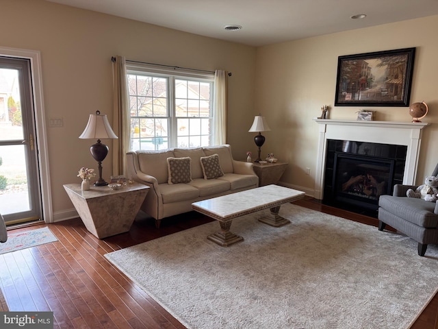 living room featuring dark hardwood / wood-style floors