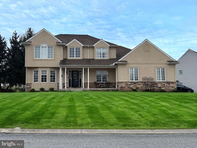 view of front facade with a front lawn