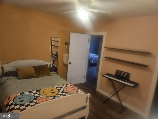 bedroom featuring ceiling fan and dark hardwood / wood-style flooring