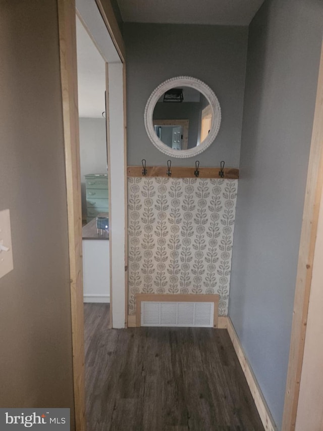 bathroom with hardwood / wood-style flooring