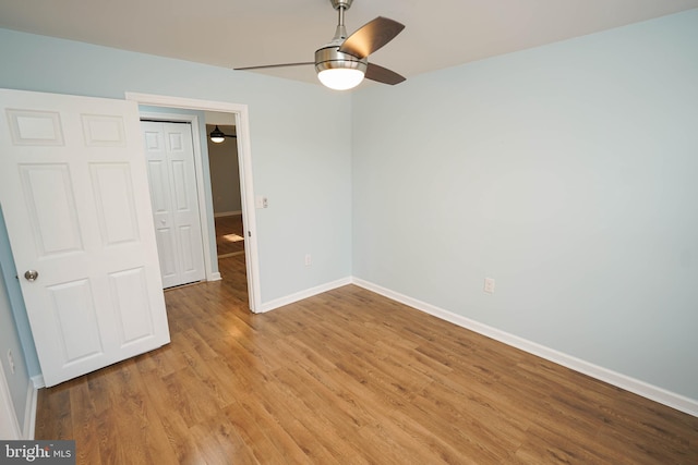 interior space with ceiling fan and light hardwood / wood-style floors