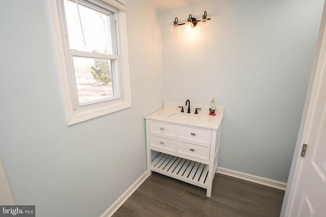 bathroom with vanity and wood-type flooring