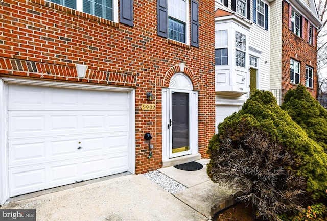 property entrance with a garage