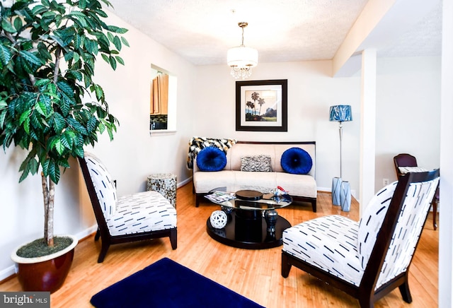 living area with hardwood / wood-style floors