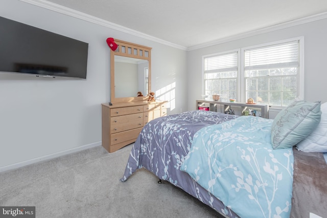 carpeted bedroom featuring ornamental molding