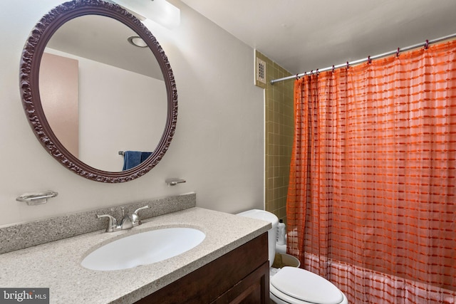 full bath with toilet, visible vents, shower / tub combo with curtain, and vanity