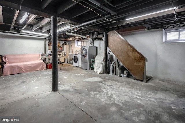 basement with washing machine and dryer