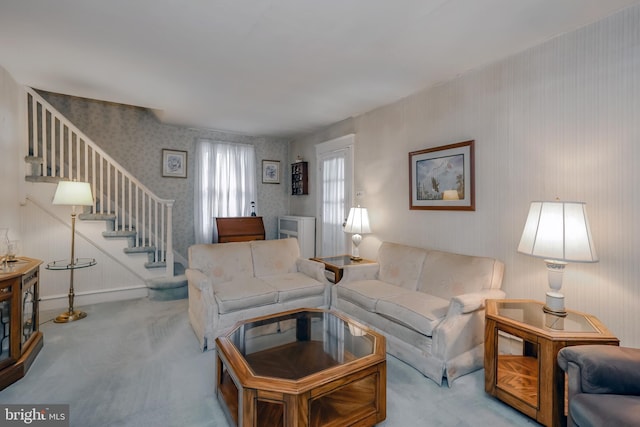 living room featuring light colored carpet