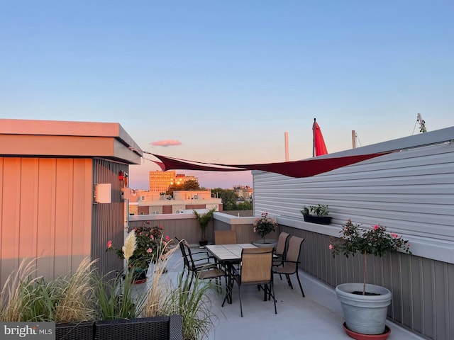 view of patio terrace at dusk