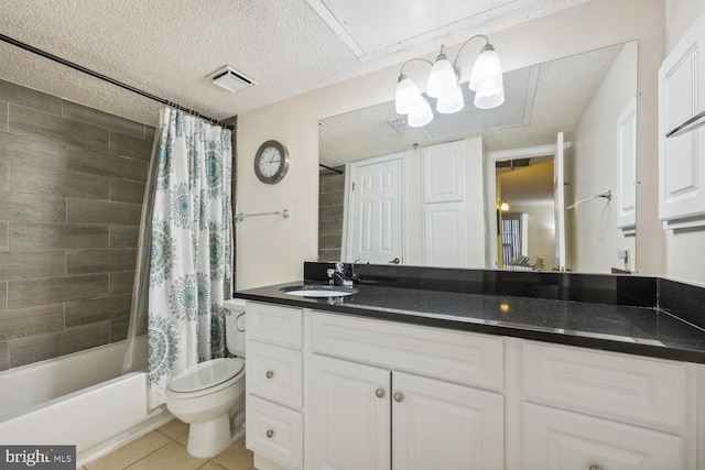 full bathroom featuring vanity, shower / tub combo, toilet, tile patterned floors, and a textured ceiling