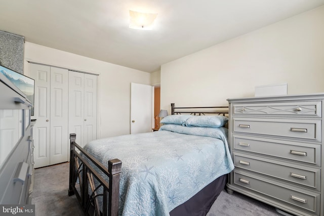 carpeted bedroom with a closet