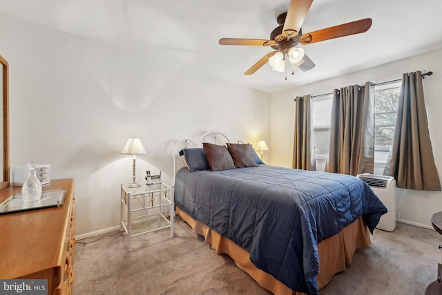 bedroom with baseboards, carpet, and ceiling fan