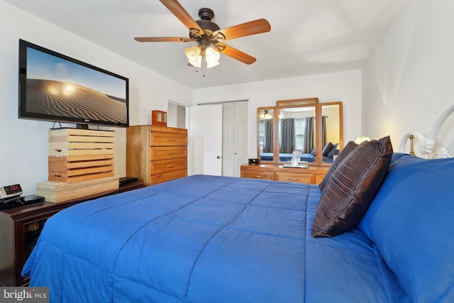 bedroom featuring a closet and ceiling fan