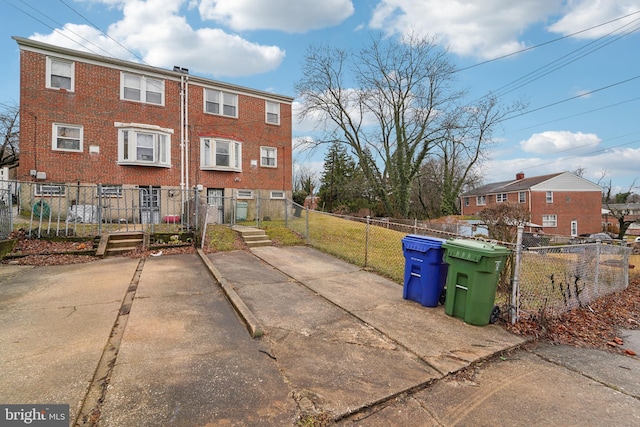 exterior space with a fenced front yard