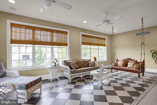 living room with ceiling fan