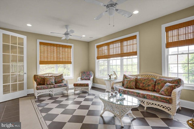 living room featuring ceiling fan