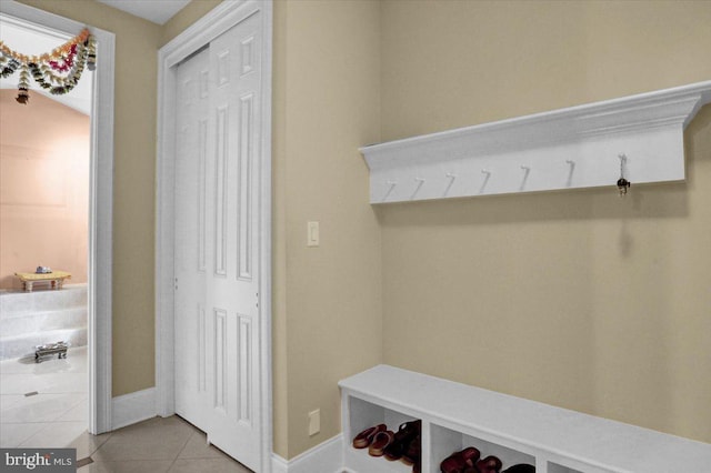 mudroom with light tile patterned floors