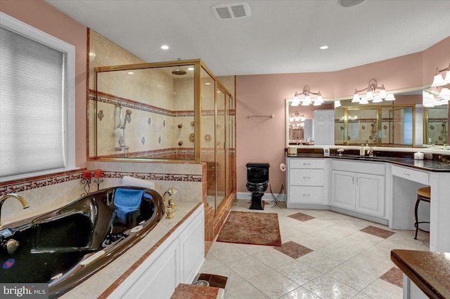 bathroom with vanity, separate shower and tub, and tile patterned floors