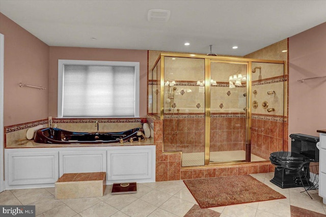 bathroom featuring independent shower and bath, tile patterned floors, and toilet