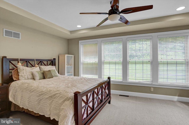 bedroom with ceiling fan and carpet