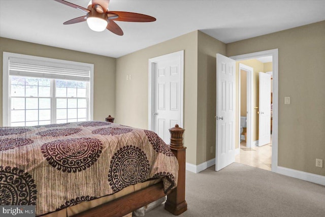 carpeted bedroom featuring ceiling fan