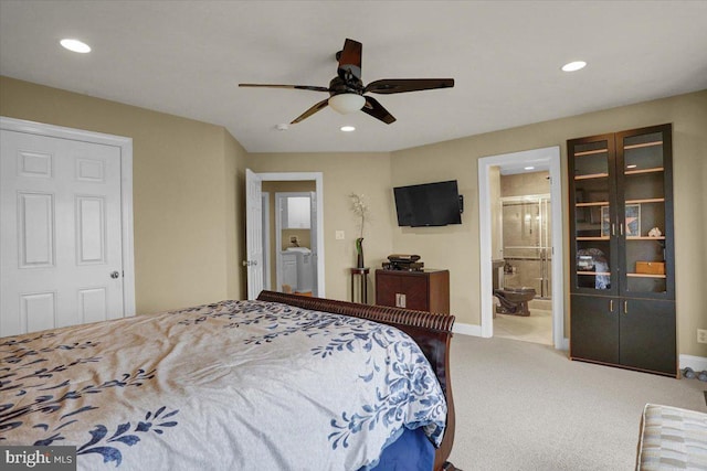 carpeted bedroom with connected bathroom and ceiling fan