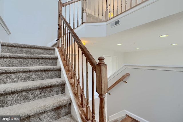 stairway with a high ceiling