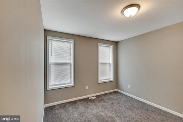 view of carpeted spare room