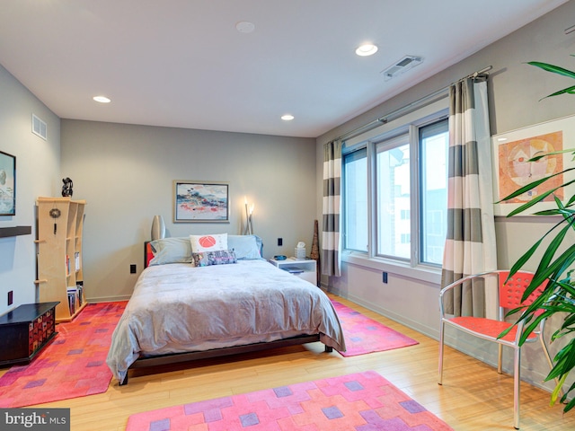 bedroom featuring light hardwood / wood-style floors