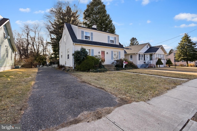 view of front property with a front lawn