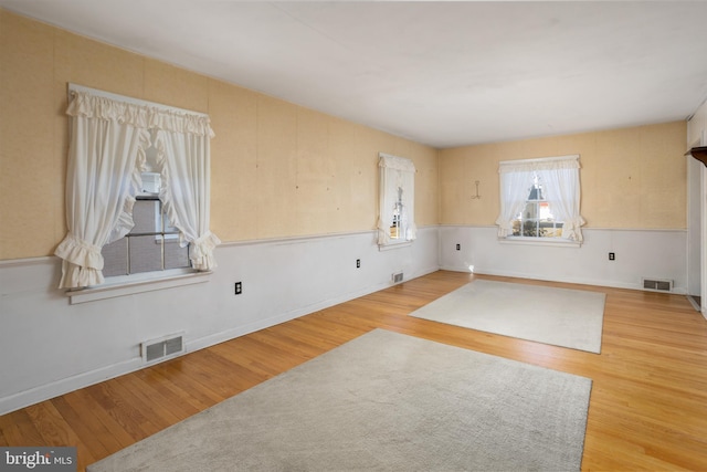 unfurnished room featuring wood-type flooring