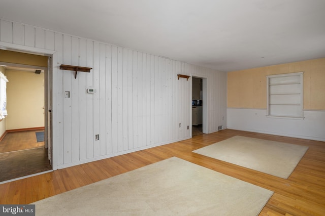 unfurnished room featuring wood-type flooring