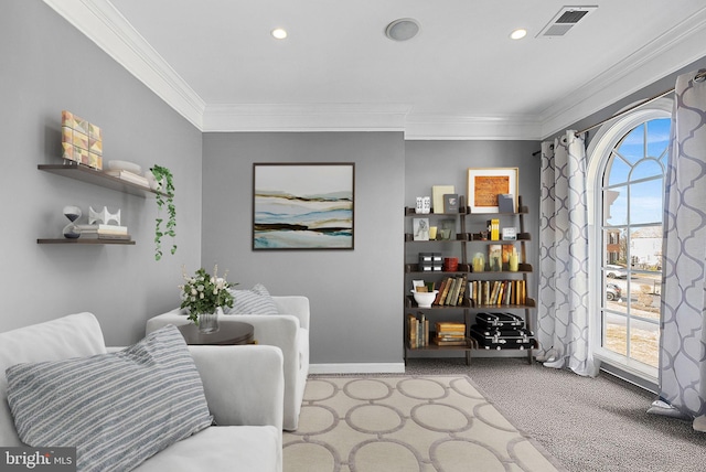 sitting room featuring light colored carpet and ornamental molding