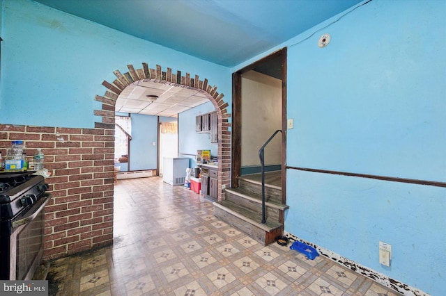 view of patio / terrace with a baseboard heating unit