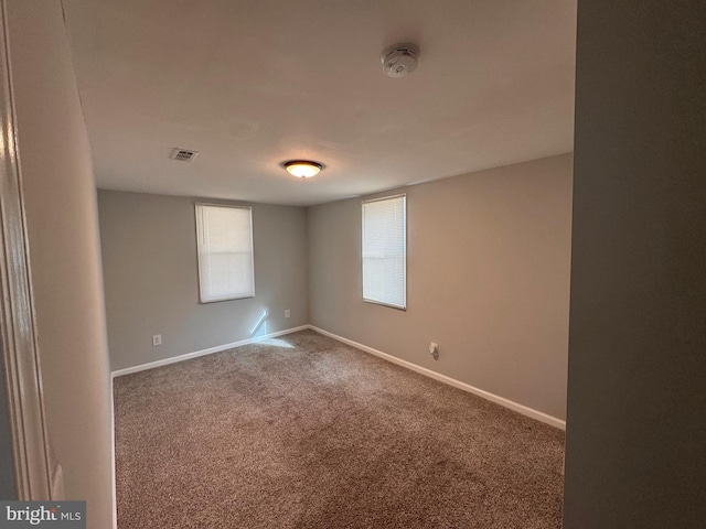 empty room with carpet floors