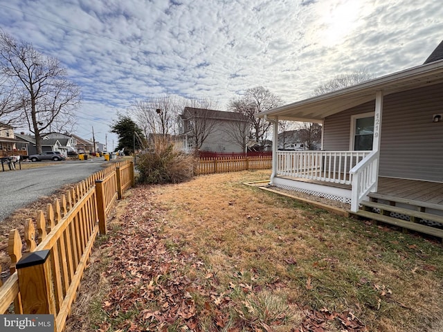 view of yard with a porch