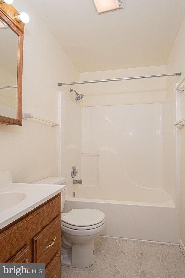 full bath with toilet, shower / bathing tub combination, and vanity