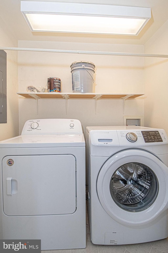 laundry room featuring washer and dryer and laundry area