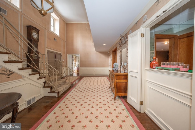 foyer with dark hardwood / wood-style flooring