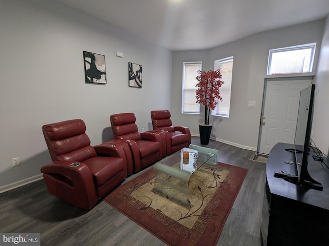 living room with dark hardwood / wood-style flooring