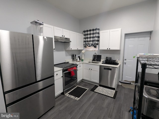 kitchen featuring stainless steel appliances, sink, white cabinets, and dark hardwood / wood-style flooring